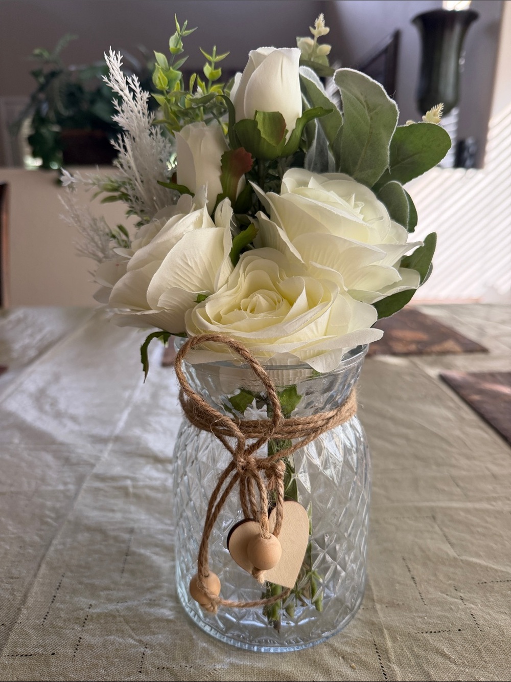 Floral arrangement in glass jar with lights used for Wedding reception. I have 3